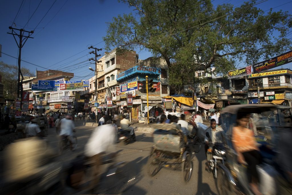 Traffic in a street corner typical for volunteer in india