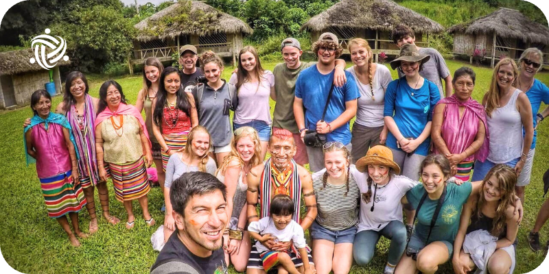 a group of volunteers and locals in latin america

